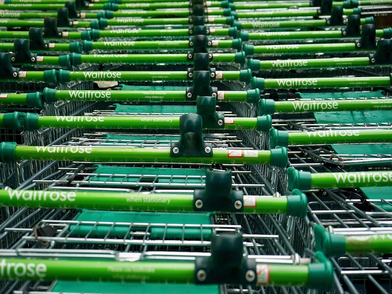 Waitrose shopping trolleys in rows