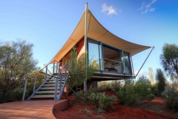 Stay in a canvased-roof cabin surrounded by the rugged wilderness of the Simpson desert.