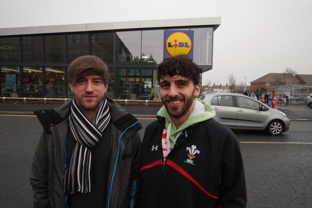 Nic James and Shaun Edwards are Welsh learners who are finding inconsistent use of Welsh at Lidl 
