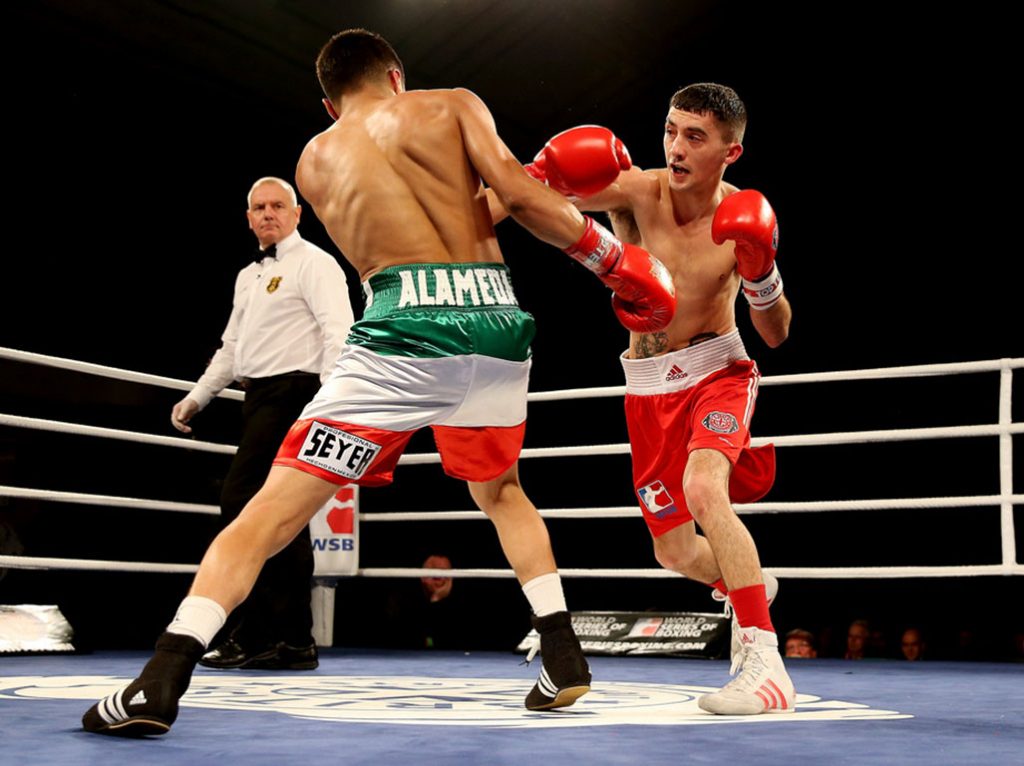 Wales's Andrew Selby (R) punching Mexico's Aaron Alameda