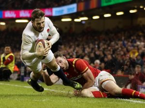11.02.17 - Wales v England, RBS 6 Nations - Elliot Daly of England beats Alex Cuthbert of Wales to score try