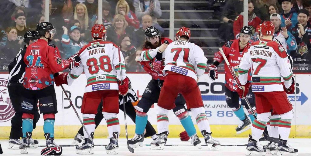 Devils' player-coach Andrew Lord fights with Giants'