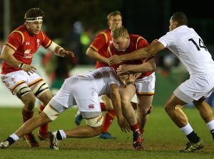 10.02.17 - Wales U20s v England U20s - U20s 6 Nations Championship - Keiron Assiratti of Wales is tackled by Ollie Dawe and Joe Cokanasiga of England. Credit: Huw Evans Picture Agency