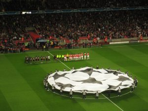 Two teams line up before a Champions League game