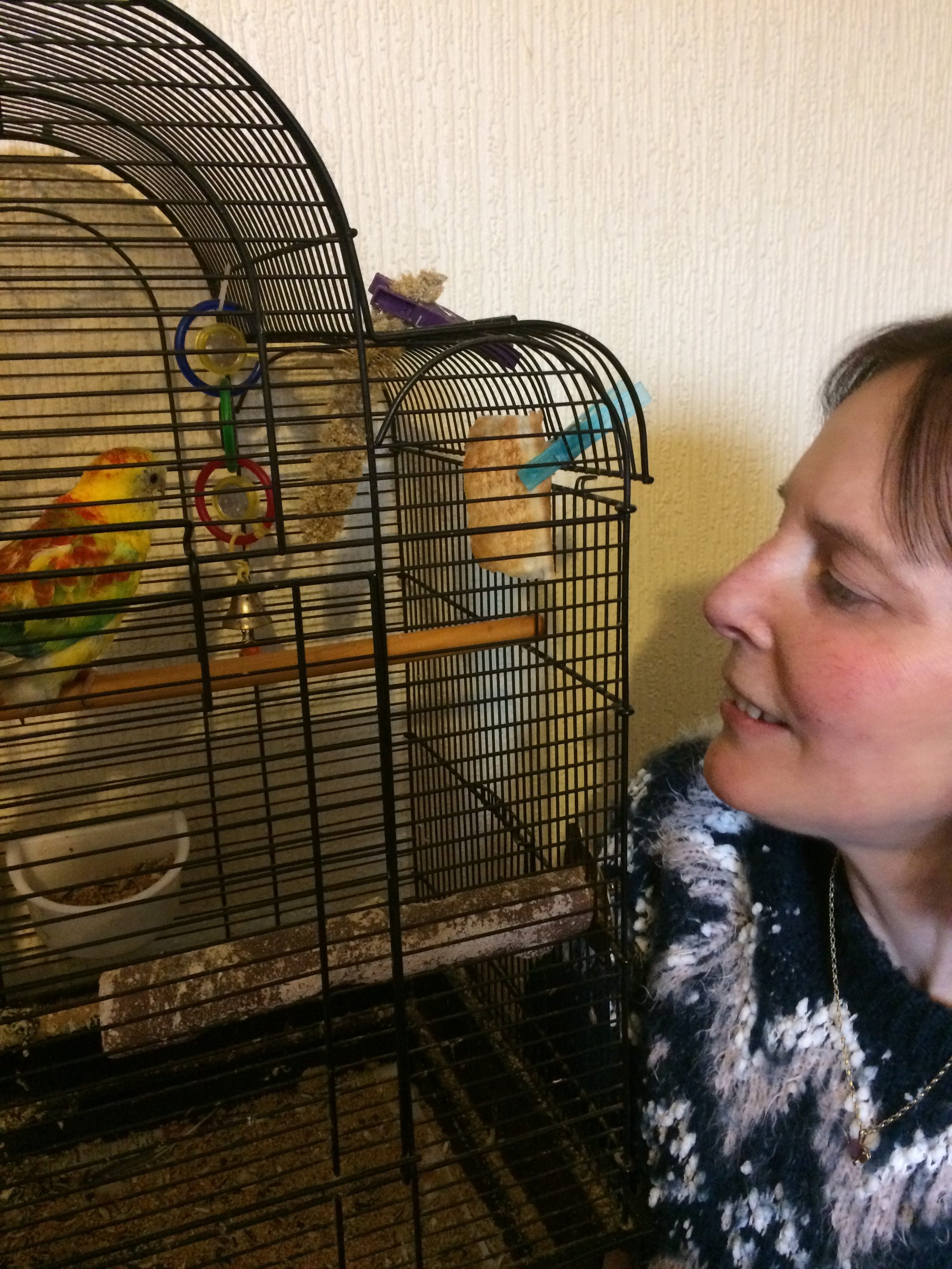 Tracey and her pet bird Angus