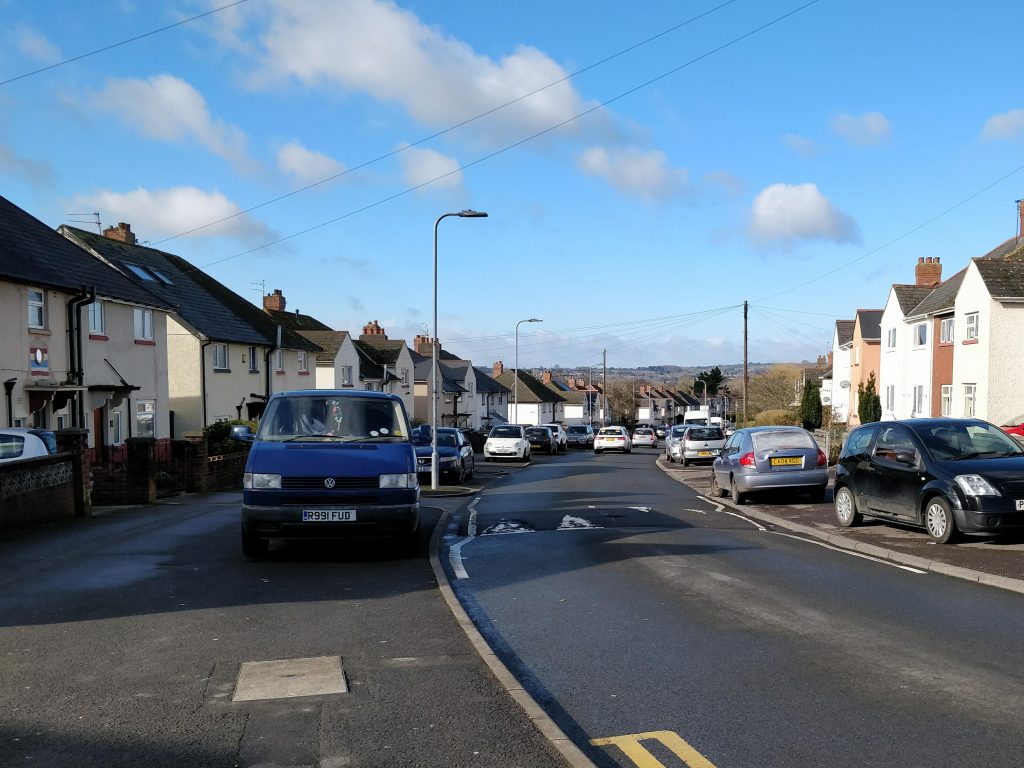 Lots of cars are parked on the pavement, Mynachdy Road