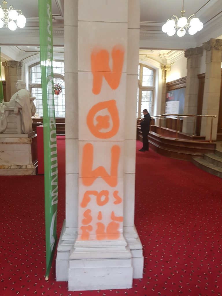The vandals managed to spray every column in the building. 