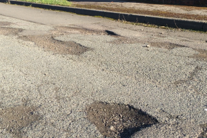 An example of potholes in Clos William, Rhiwbina
