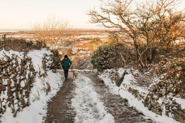 Walking up an icy Welsh road.