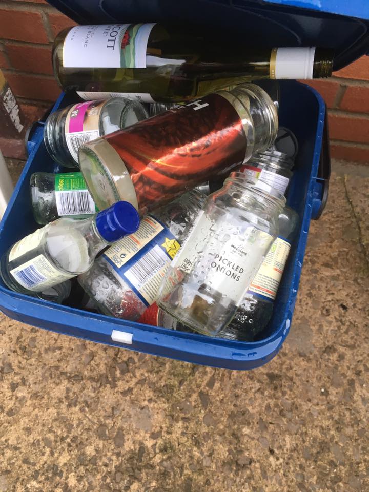 Small bins and leaky lids early feedback on glass recycling The